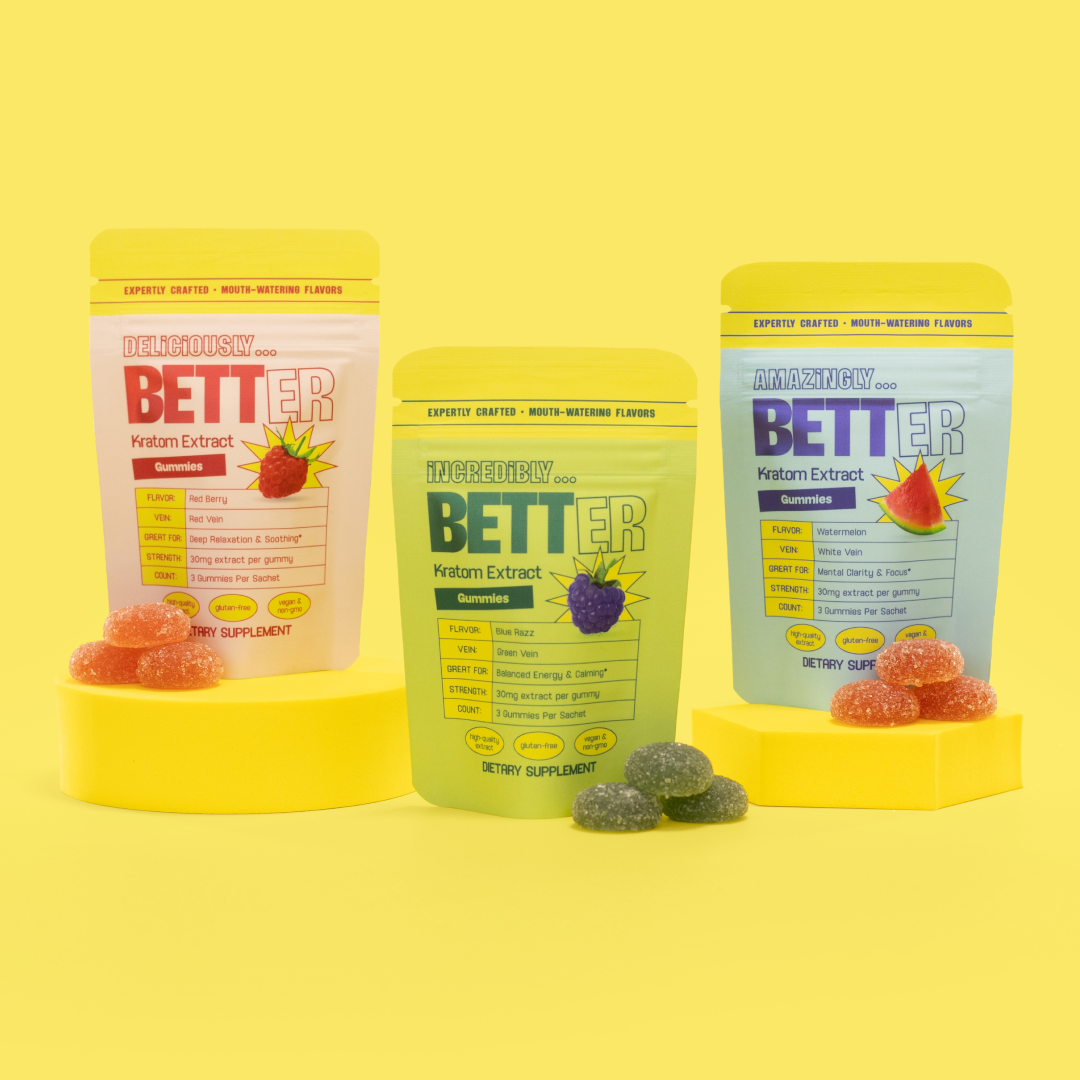 Three colorful BETTER gummy supplement pouches and three gummies on yellow background